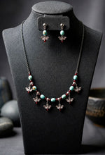 Oxidised Lotus Charm Turquoise Bead Necklace