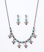 Oxidised Lotus Charm Turquoise Bead Necklace