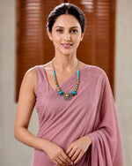 Mahira Turquoise & Gold Spiral Pendant Necklace