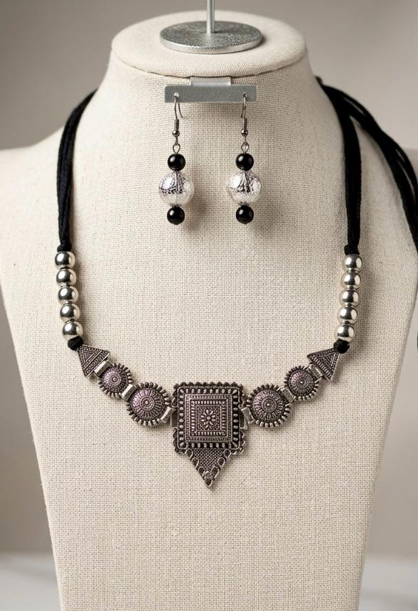 Noor Oxidised Silver Coin Pendant Necklace Set