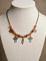 Celtic Knot Amber Glass Necklace