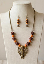 Brass Durga Multi-Arm Rudraksha Orange Bead Necklace