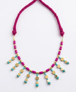 Magenta and turquoise tribal statement necklace for women by HeerMaya, handcrafted brass jewellery