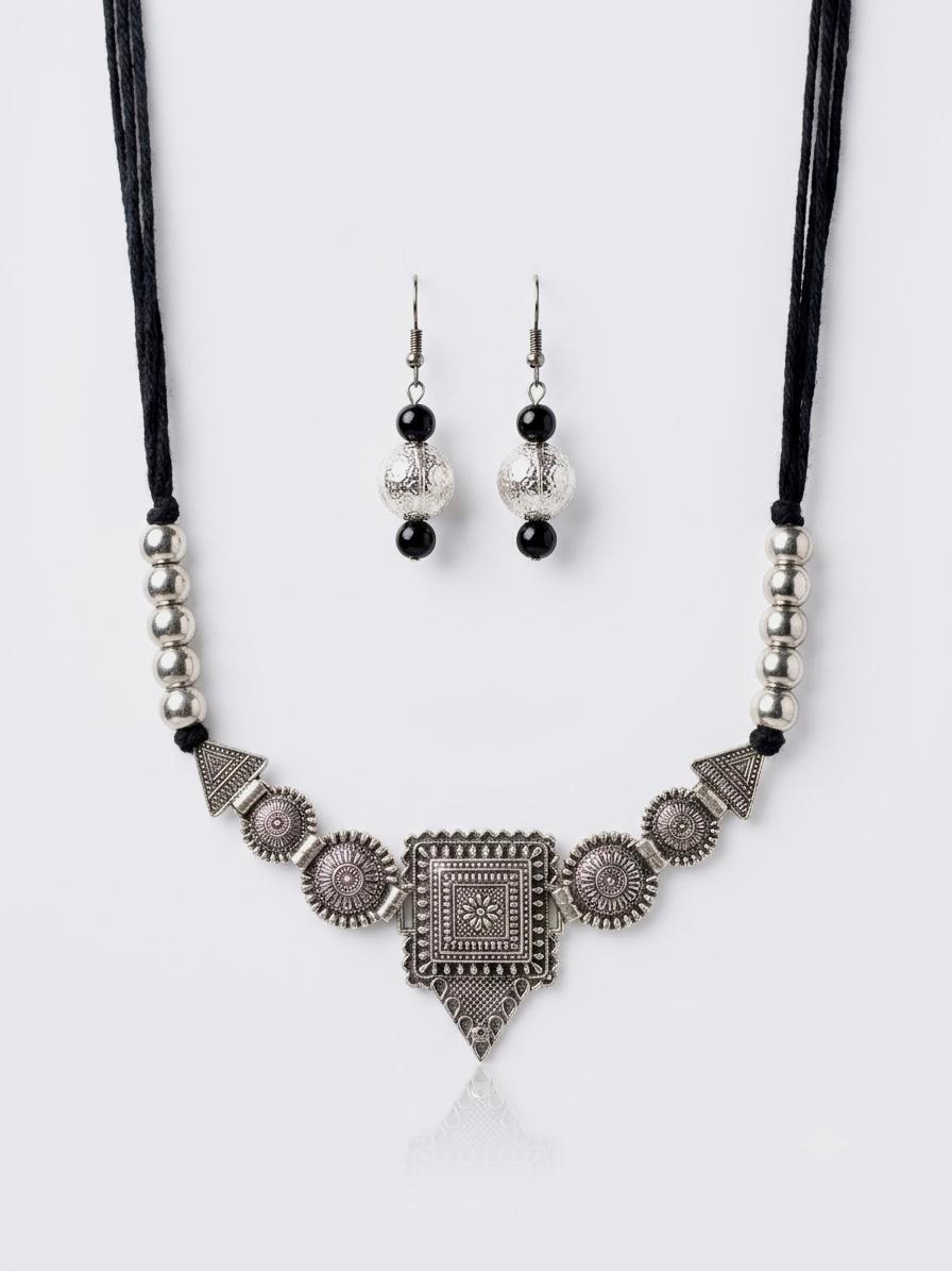 Noor Oxidised Silver Coin Pendant Necklace Set
