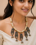 Dual-Tone Tribal Plaque Necklace with Carved Beads & Ghungroo Bells