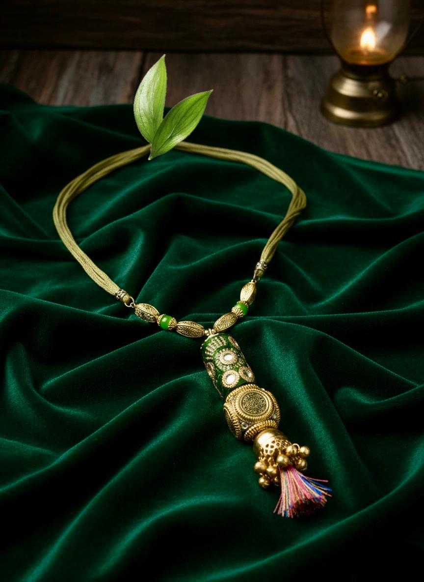 Emerald Tassel Heritage Necklace