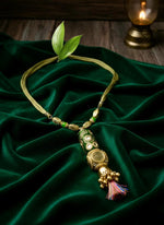 Emerald Tassel Heritage Necklace